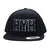 Black and white 6 panel HYH with puff embroidery. Grind, Hustle, Grit.